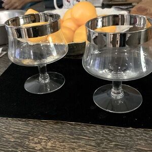 Two Dorothy Thorpe snifter glasses. Absolutely beautiful sterling silver rim